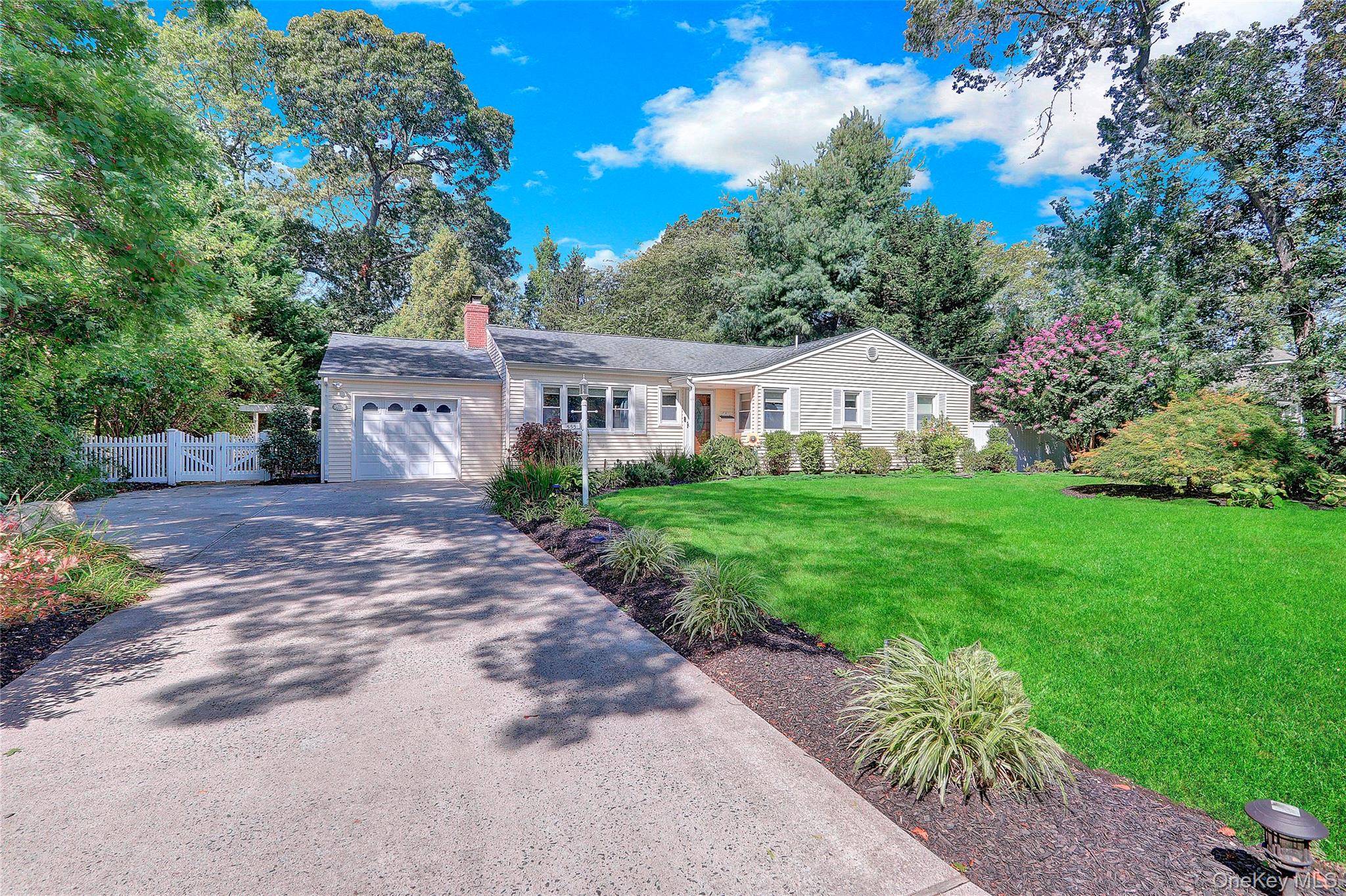 555 Ackerson Blvd in Brightwaters NY is a beautifully maintained ranch style home offering 3 bedrooms and 2 full baths with a spacious open floor plan that flows from the ...