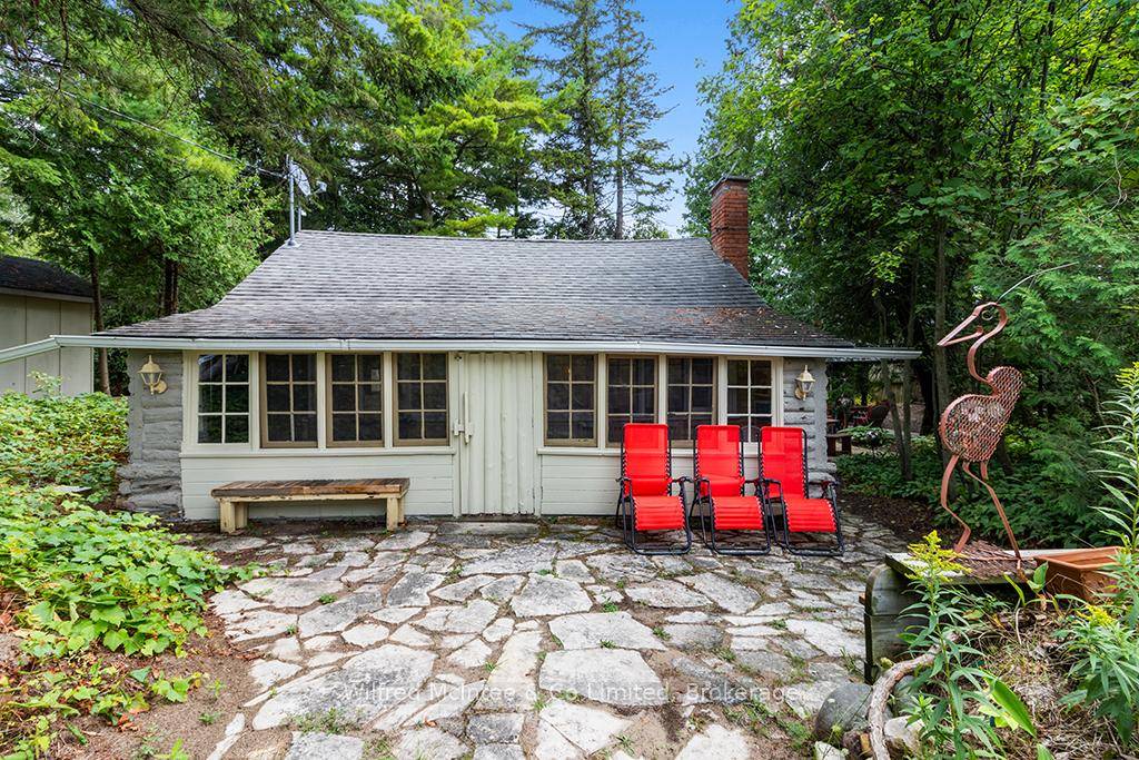 Just a short stroll from the soft sandy shores of Lake Huron, this charming cottage combines rustic character with modern updates.