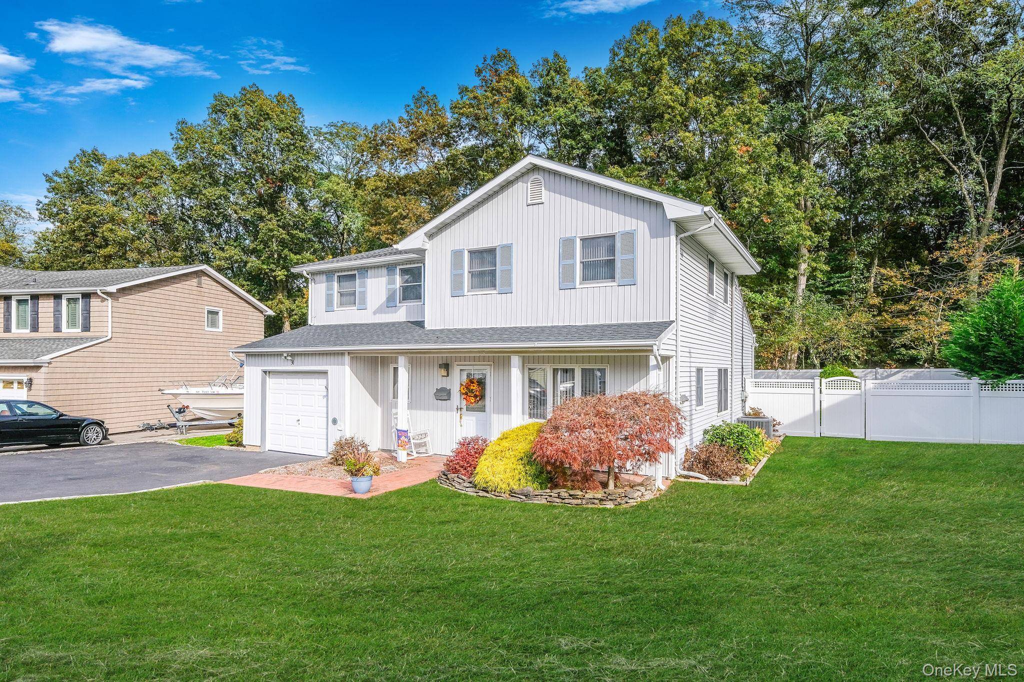 Beautifully maintained colonial located in a lovely tree line neighborhood in Kings Park with top rated schools.