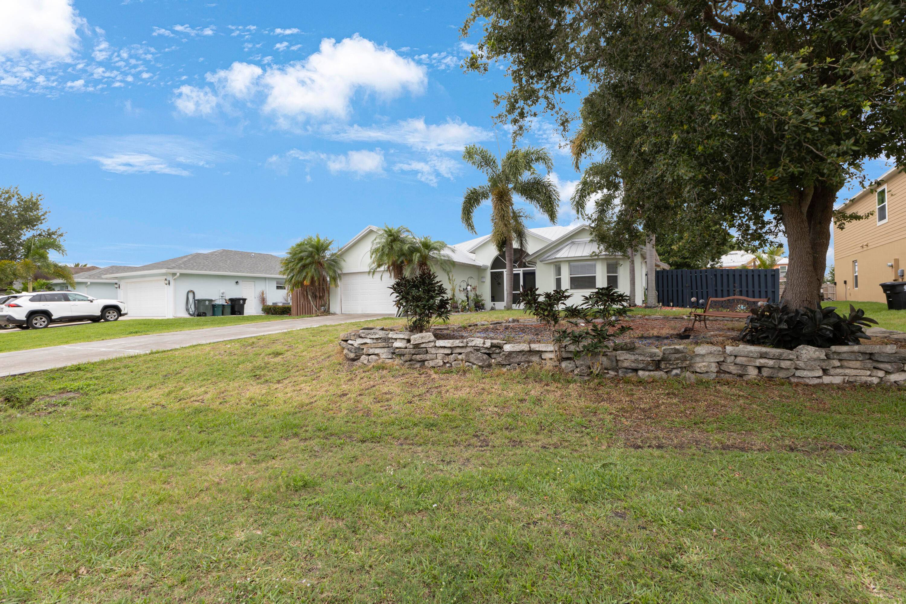 Welcome to 427 SW Cahoon Court, a stunning 3 bedroom, 2 bathroom, 2 car garage screened pool home that perfectly blends comfort, style, and entertainment.