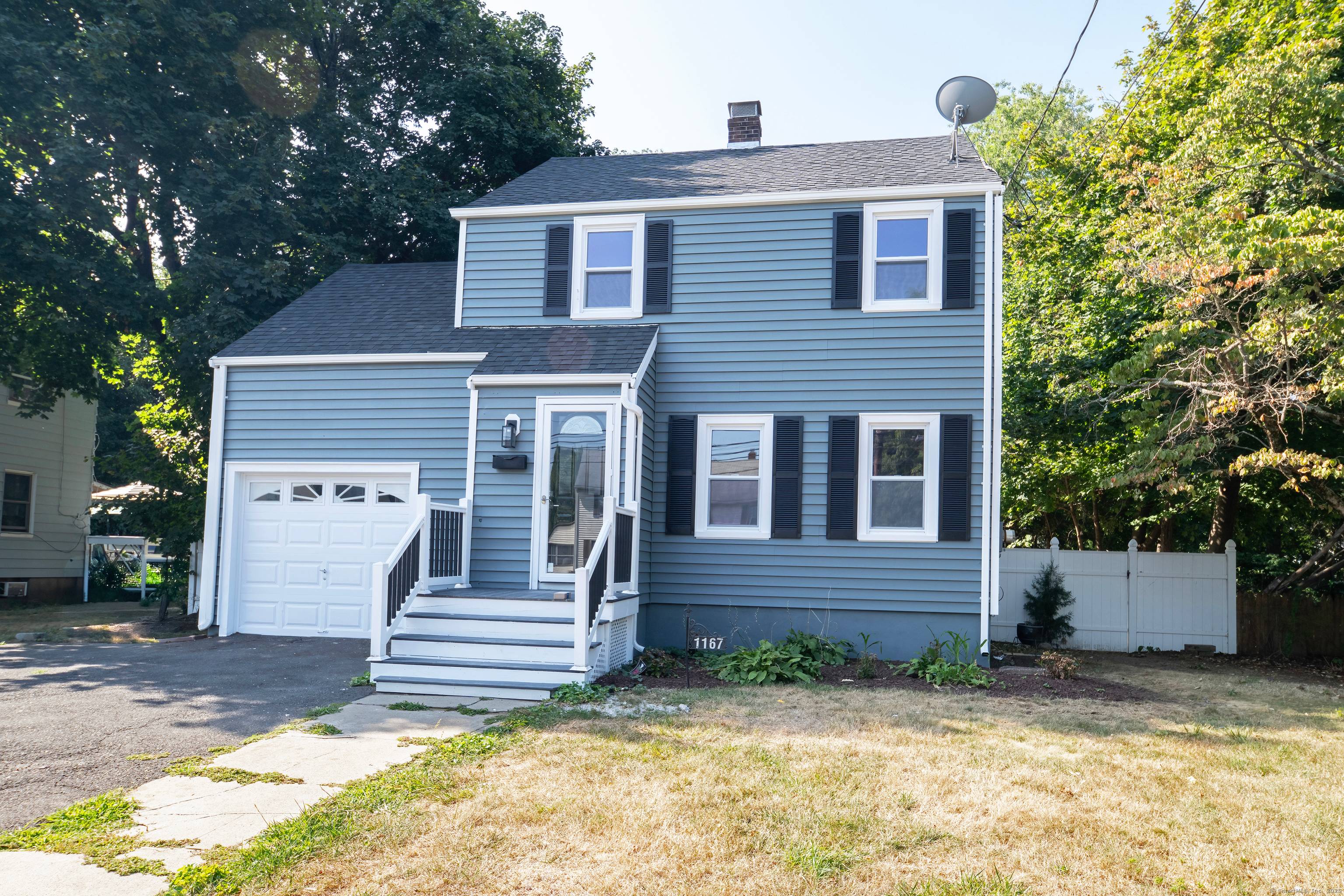 Charming McNeil 3 bedroom Colonial with a fenced in yard, central air, gleaming hardwood flooring, brand new kitchen, main level den, 1 car garage, huge deck plus a partially finished ...