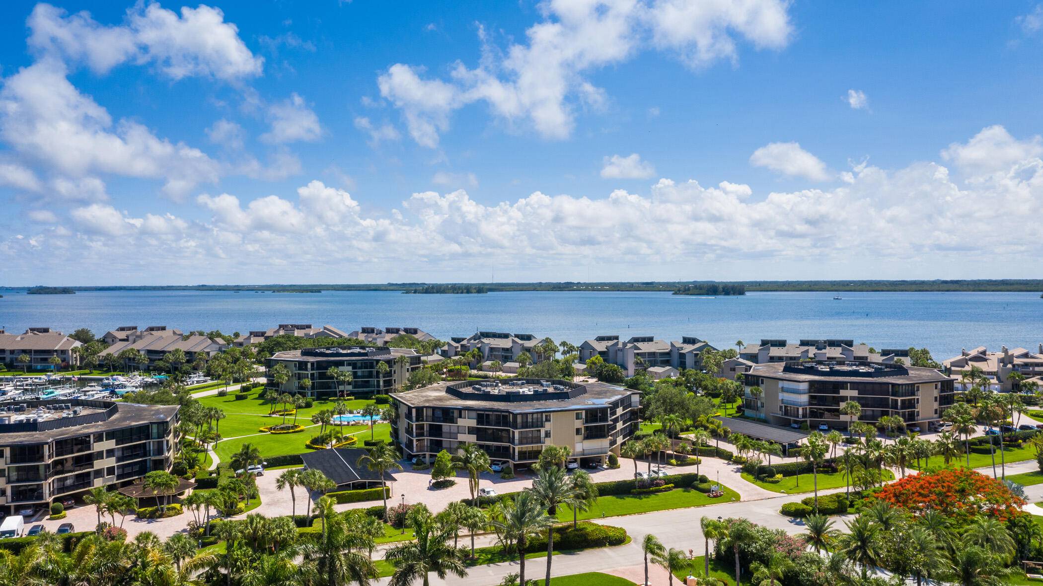 Enjoy natural light and a peek at the river from this penthouse condo, featuring 2 bedrooms, 2 baths, plus Florida room.
