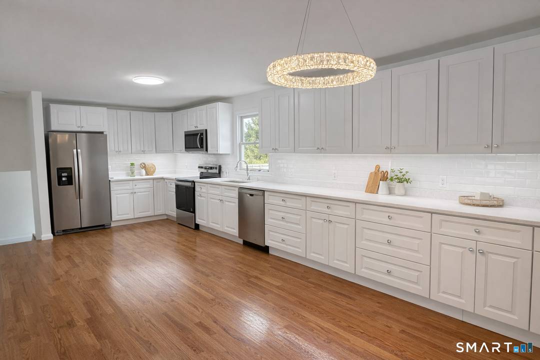Fully renovated and move in ready, this updated split level home at 15 Dairy Farm Rd offers modern living with every major improvement already completed.