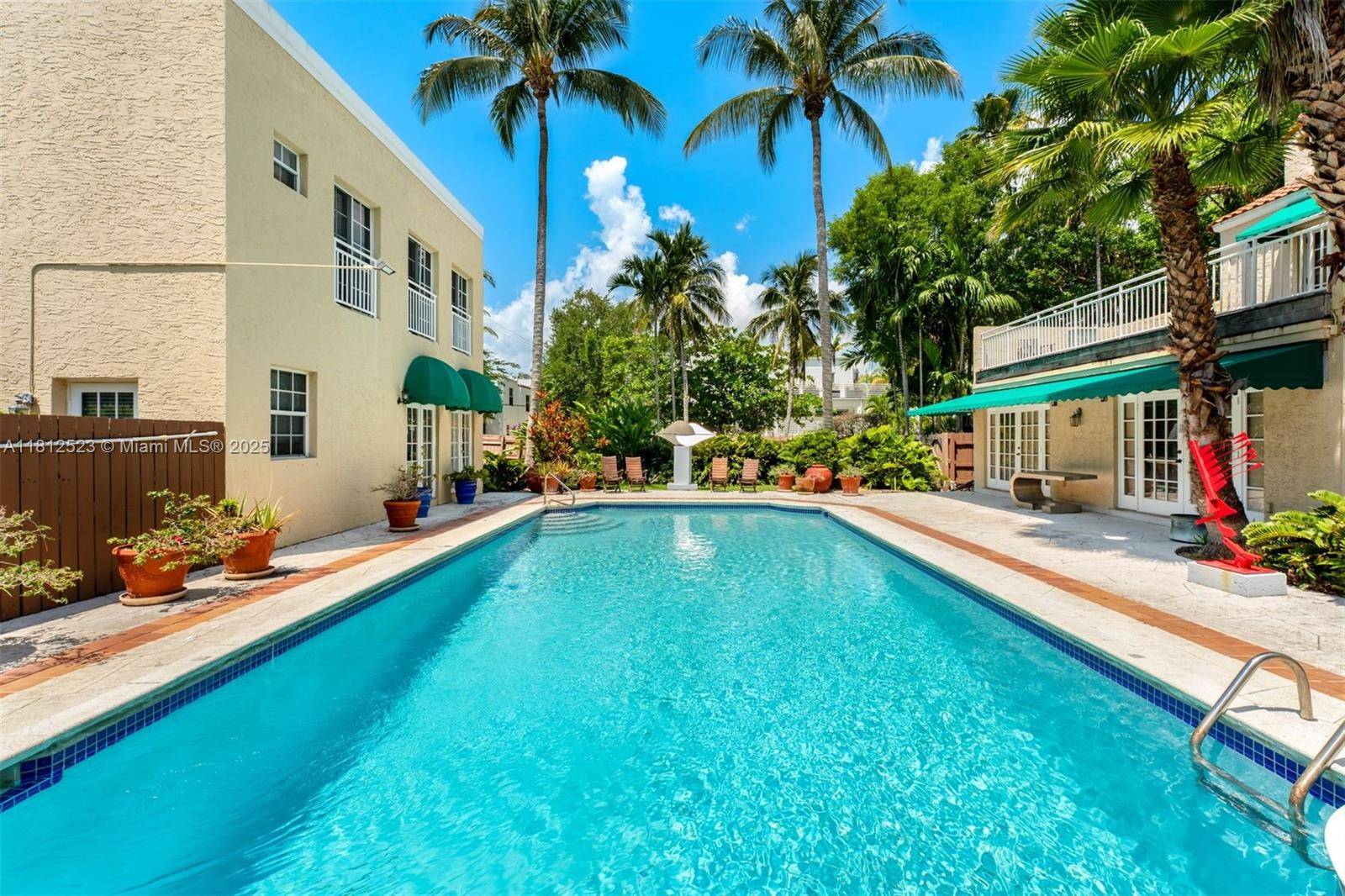 Become the ultimate host at this North Coconut Grove compound with not 1, but 2 separate guest quarters !