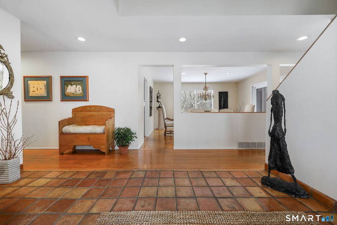 Welcome to 53 Rock Hill Road in Woodbridge privately set back from the end of the cul de sac, this stunning contemporary colonial exceeds expectations while radiating warmth and comfort.