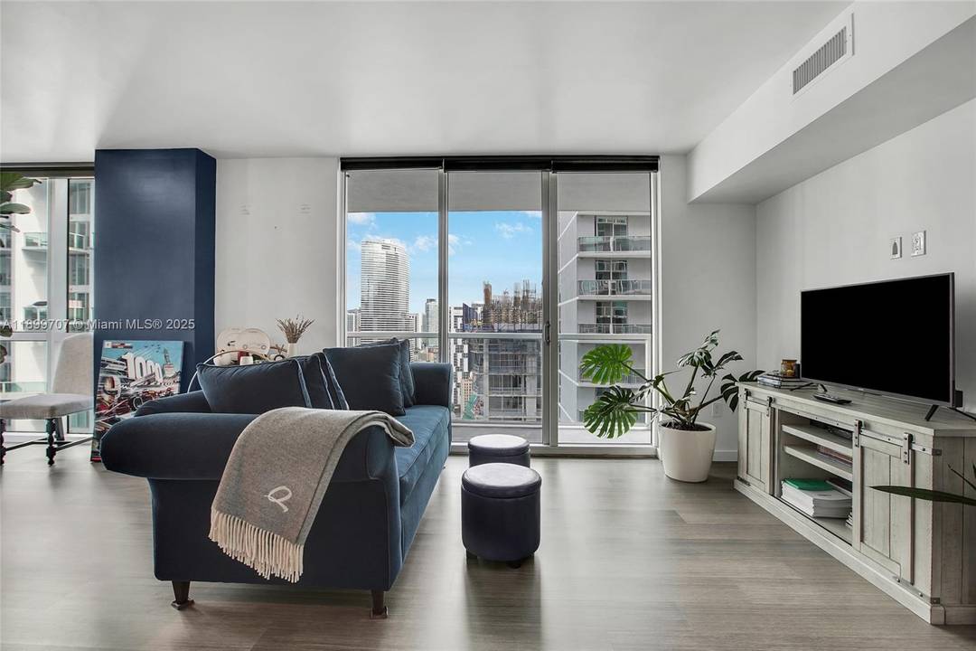 Exquisite furnished corner unit on the 37th floor, bathed in natural light with floor to ceiling windows and sweeping views of the Miami River and city skyline.