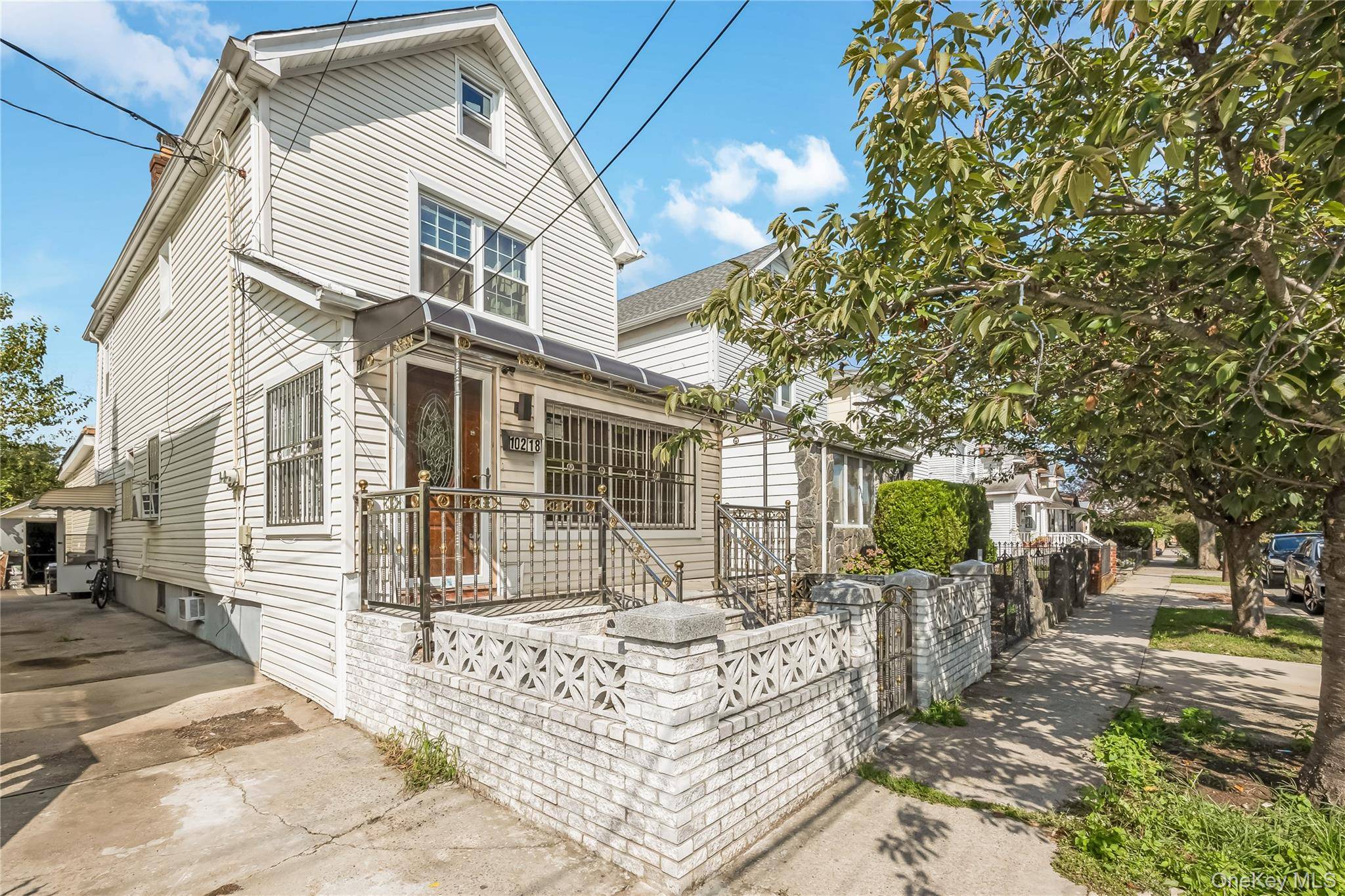 Excellent 2 Family ! Finished Basement, Private Driveway amp ; Garage.