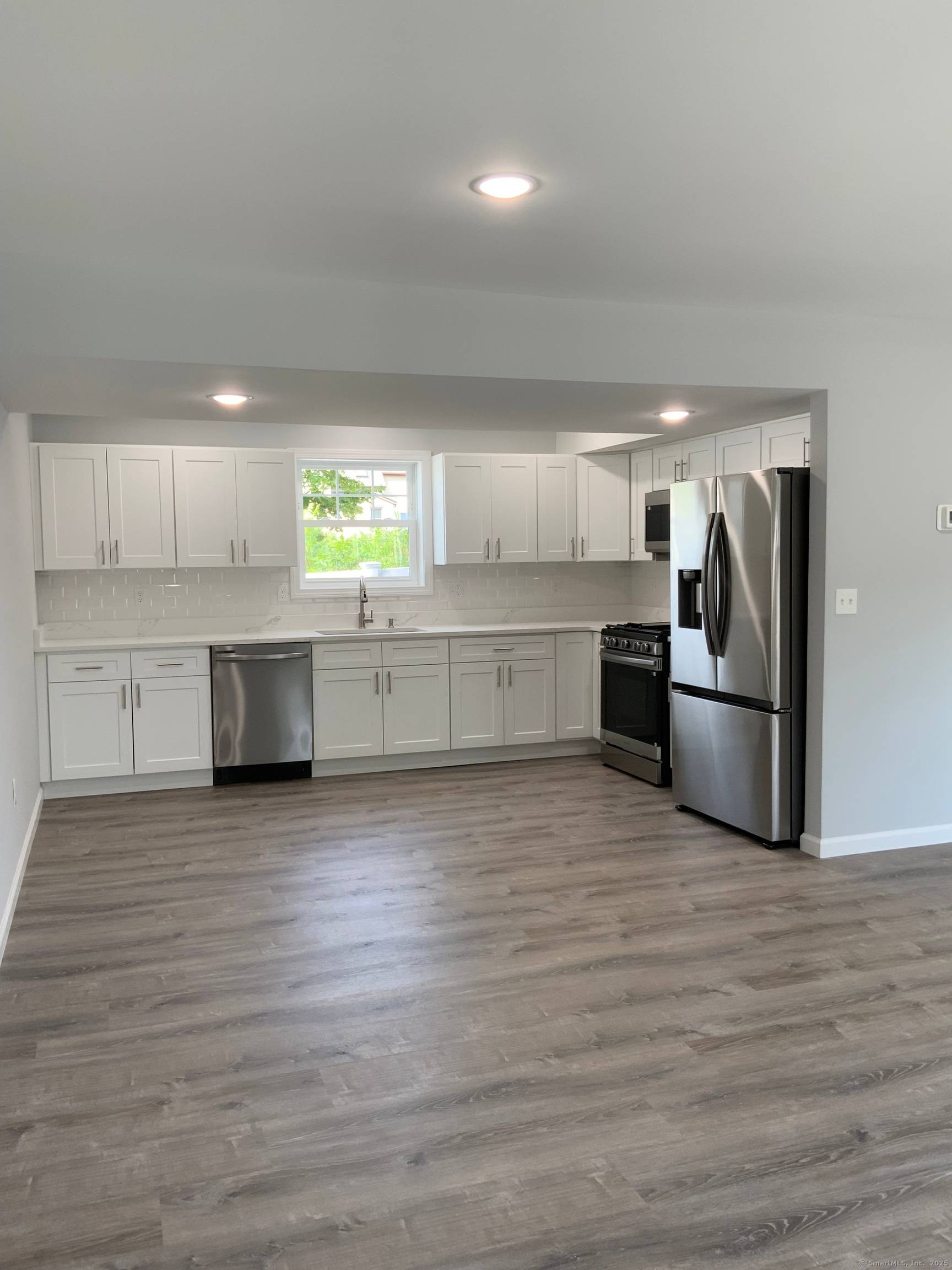 Welcome to this spacious two family home new construction duplex 3 bedrooms 1 and half bathrooms.