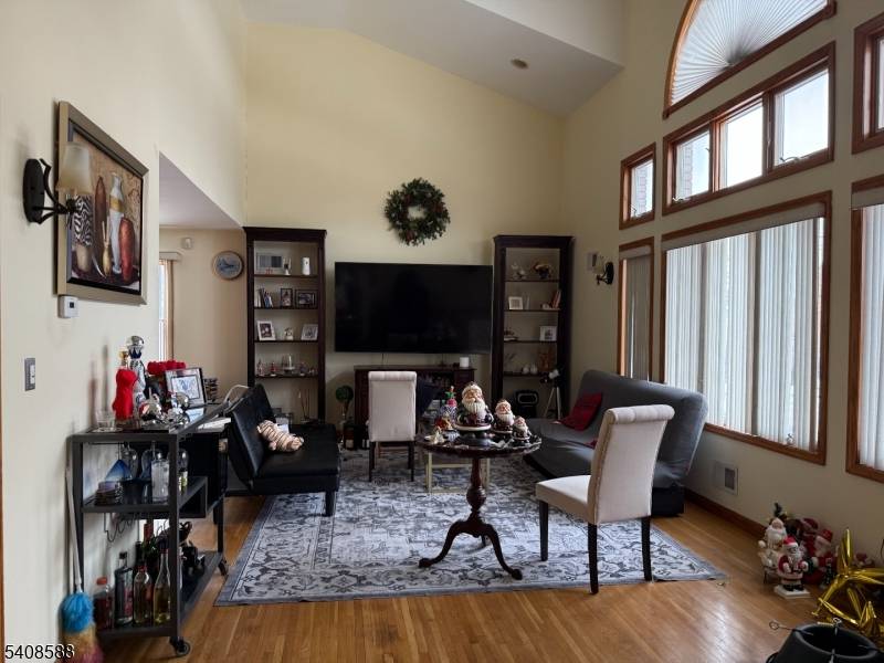 Gorgeous three bedroom, two full bath two family home featuring a spacious first floor unit with an open concept layout.