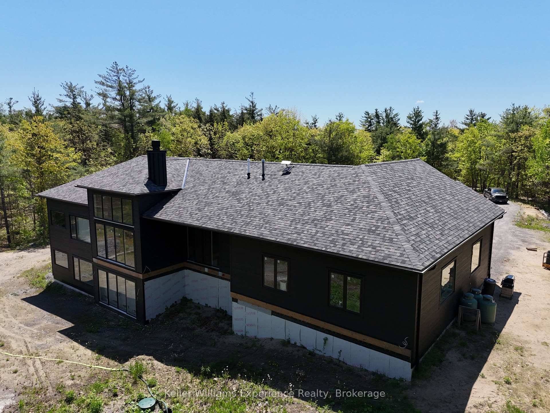 POWER OF SALE OPPORTUNITY Custom, Luxury Home on a private 4 acre lot, in beautiful Muskoka !