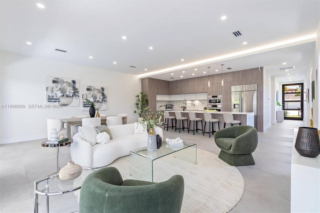 Newly constructed modern residence in the heart of Fort Lauderdale s desirable Coral Ridge neighborhood, offering refined design and effortless indoor outdoor living.