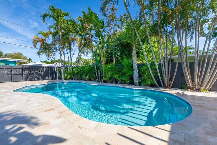 Charming, beautifully renovated 2 bedroom 2 bath House with an extra Florida room den, a storage room outside and Pool is offered for sale.