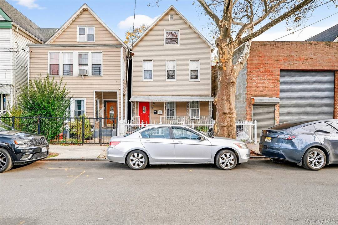 Well maintained detached three level home in the Van Nest section of the Bronx with a finished walkout basement.