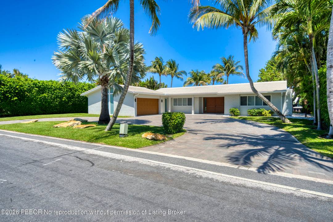 Impeccably maintained and beautifully updated, this one story contemporary 3 bedroom, 2 bath Intracoastal Waterway waterfront residence offers 100 feet of prime frontage, showcasing tranquil water views from the main ...