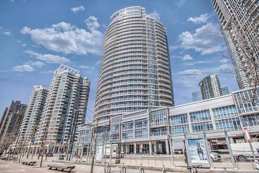 Experience luxurious waterfront living at its finest in this spacious 1 Bedroom Den Solarium condo at the prestigious 218 Queens Quay West.