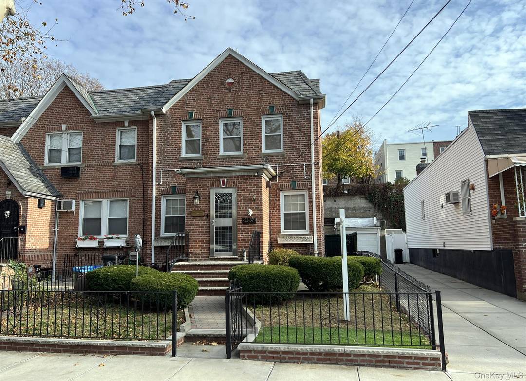 Semi Detached Tudor Style Home in Maspeth Plateau.