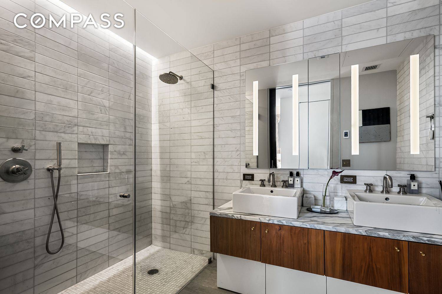 STUNNING DESIGNER UPGRADED 3 BEDROOM CONDO WITH A PRIVATE BALCONY OFF THE LIVING ROOM DEEDED STORAGE UNIT ROOFTOP CABANA WITH WEBER GAS GRILL.