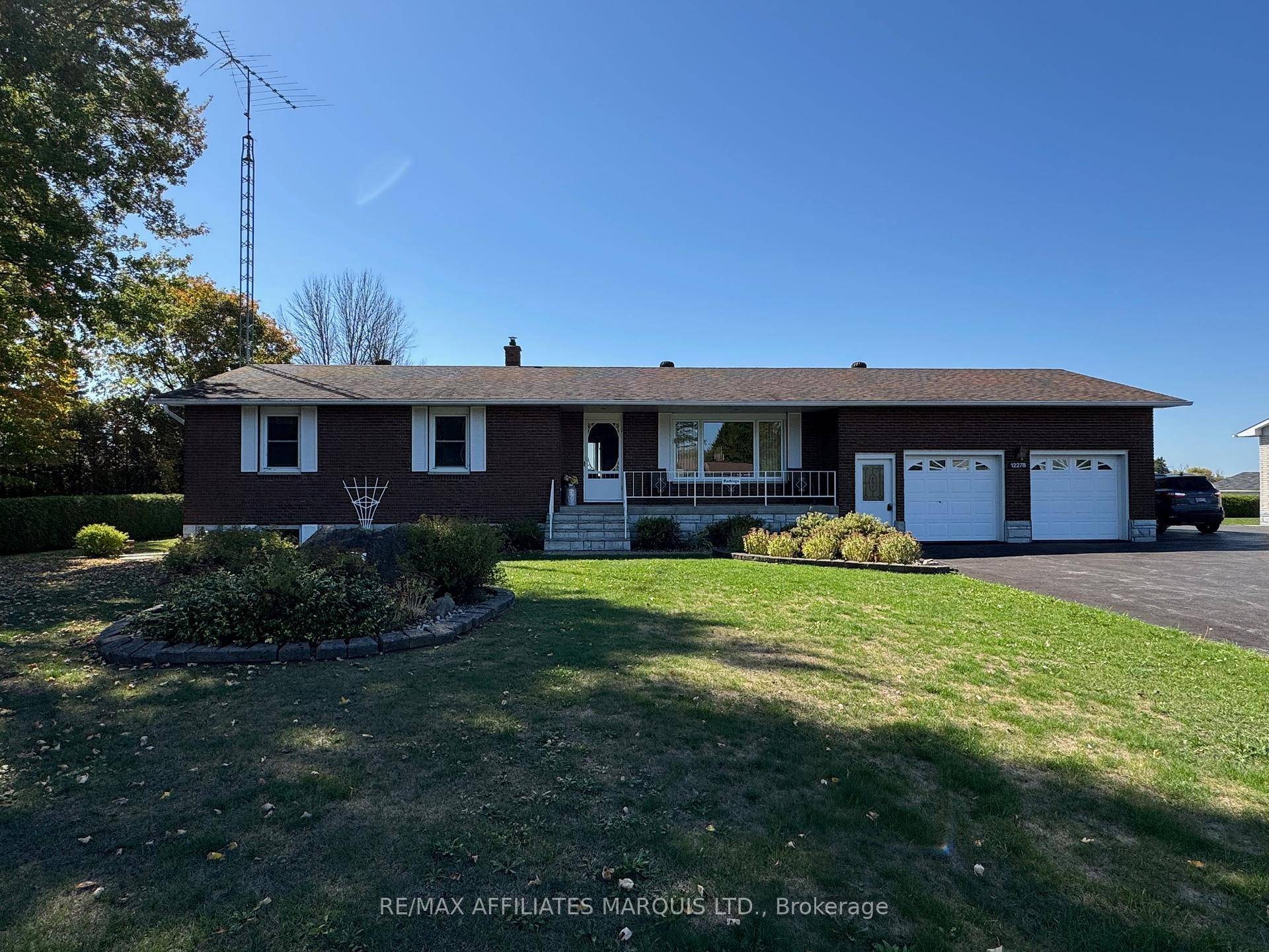 Located on the outskirts of the charming village of Williamsburg, this immaculately maintained solid brick bungalow offers the perfect blend of comfort, space, and functionality.