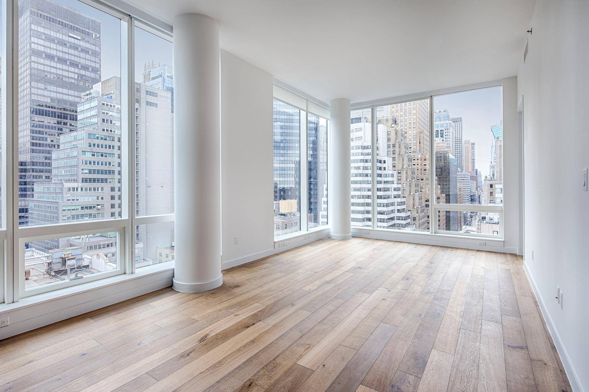 Make this pristine corner unit with mesmerizing, sweeping city views your new home or prime investment opportunity !