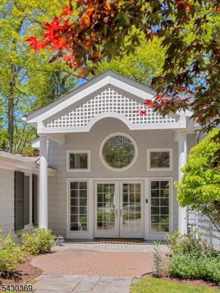Tucked into the bucolic enclave of Holmehill, this exceptional home offers the ease of one floor living paired with gracious design and sophisticated updates.