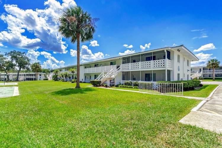 EXQUISITE CONDO WITH BOAT SLIP AND DOCK ON THE WINTER PARK CHAIN OF LAKES !