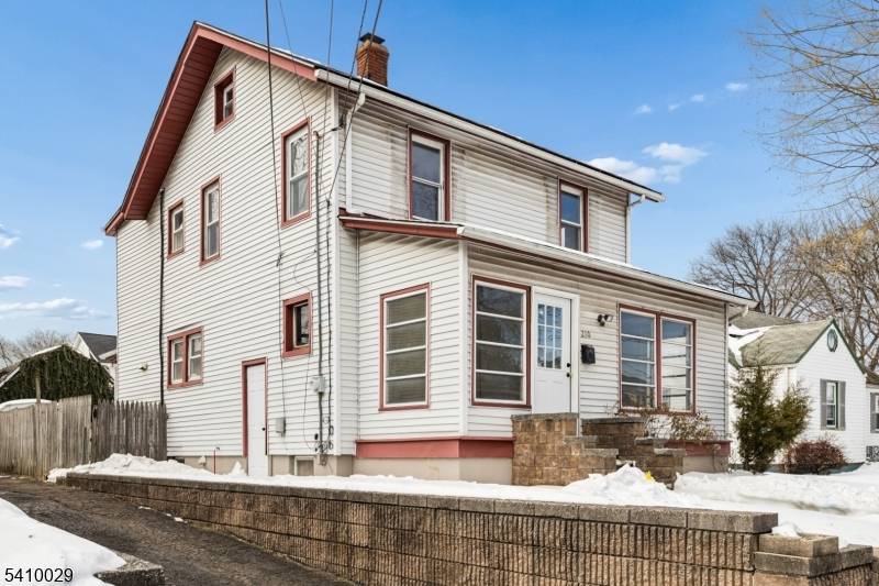 Updated Colonial combines timeless architectural charm with modern peace of mind.