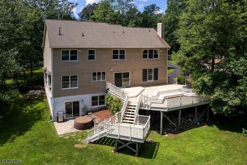 Perched atop a seven acre expanse, this radiant home makes the most of its elevated vantage point on top of the Sourland Mountain, offering sweeping views, abundant natural light, and ...