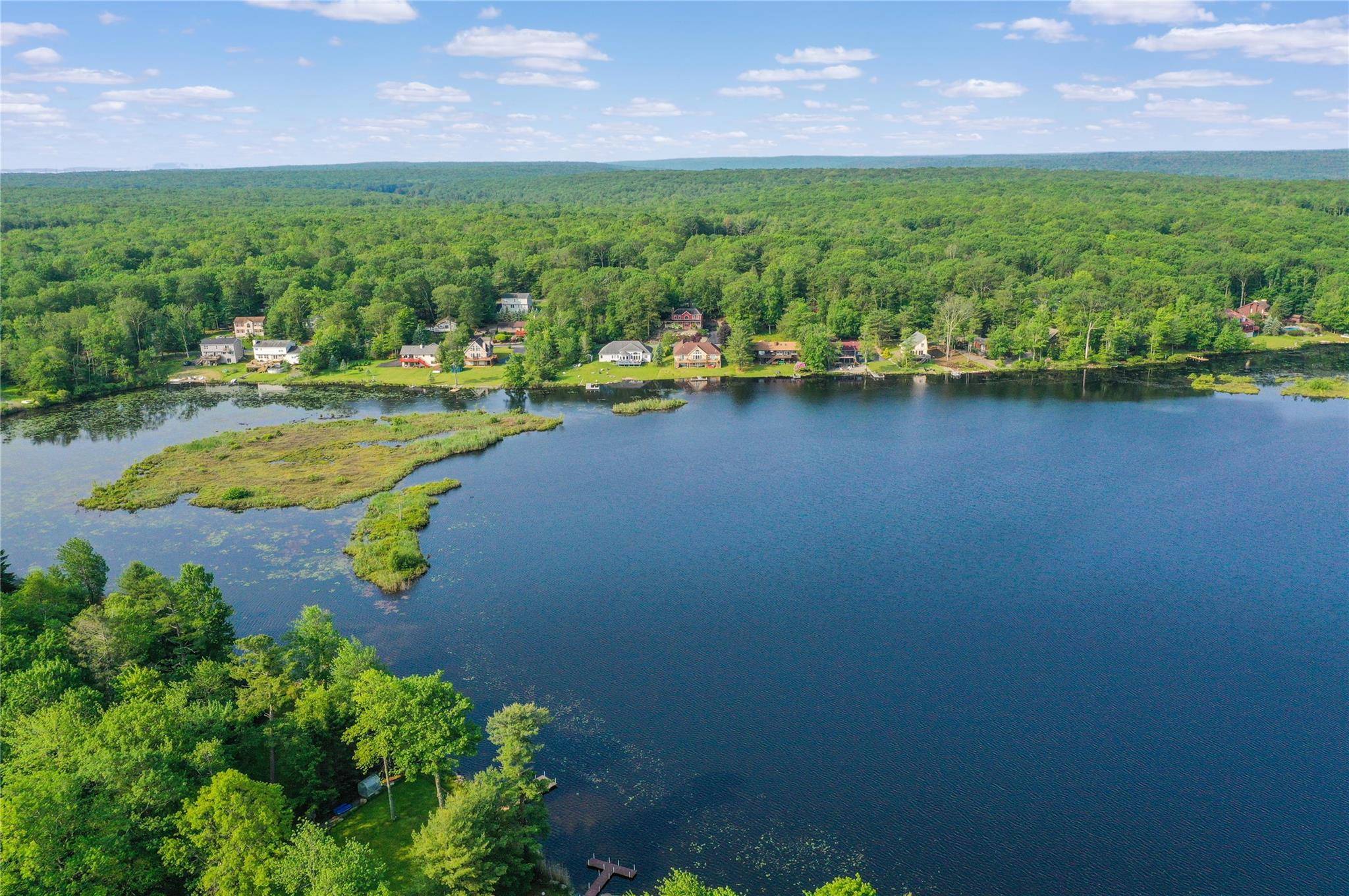 Beautiful Renovated Lake House with Prime Lakefront Location amp ; Community Amenities located in Emerald Green.