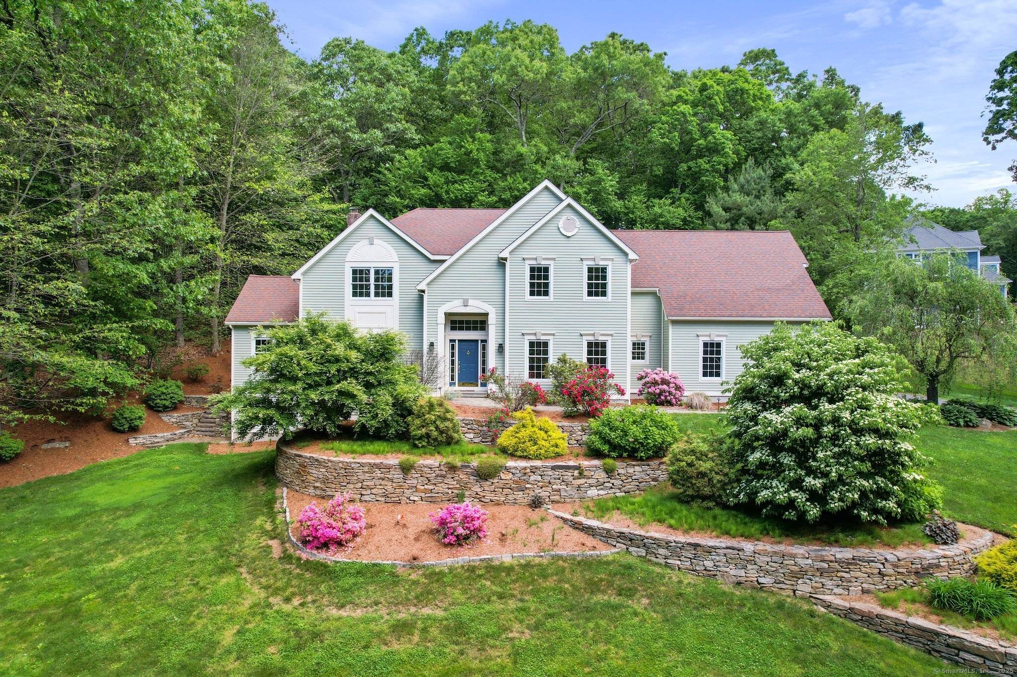 Bright and updated colonial located on over an acre lot in a quiet neighborhood close to town and Hebron Elem School.