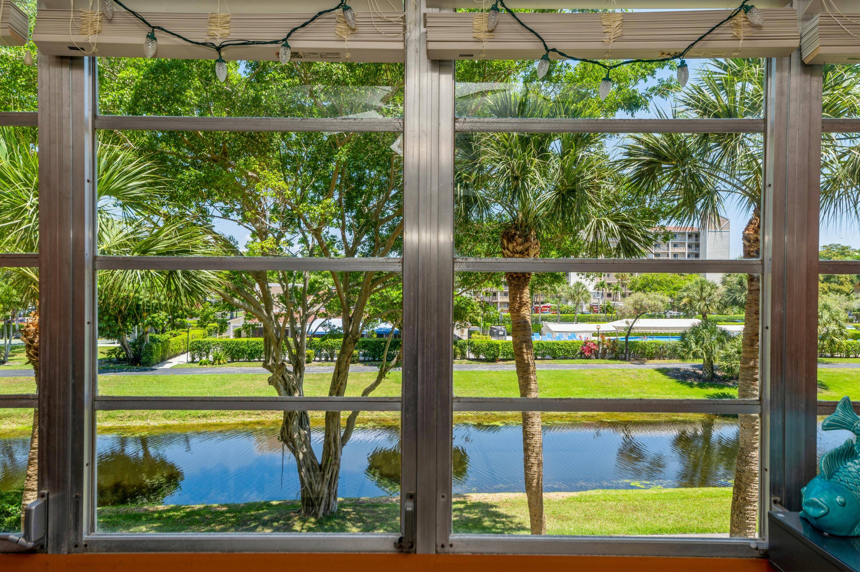 Beautiful 3rd floor condo overlooking peaceful water view and pool in desirable Bonaire Village.