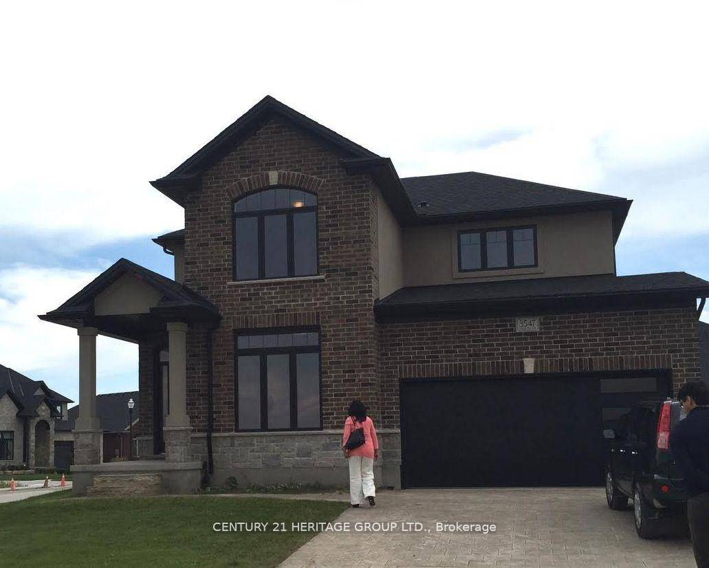 A must see..... beautifully landscaped contemporary and stylish home in Andover trails !