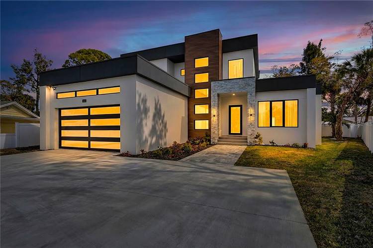 Experience luxury living in the heart of downtown Sarasota in this exceptional contemporary pool home, ideally situated at the end of a cul de sac in a quiet, family friendly ...