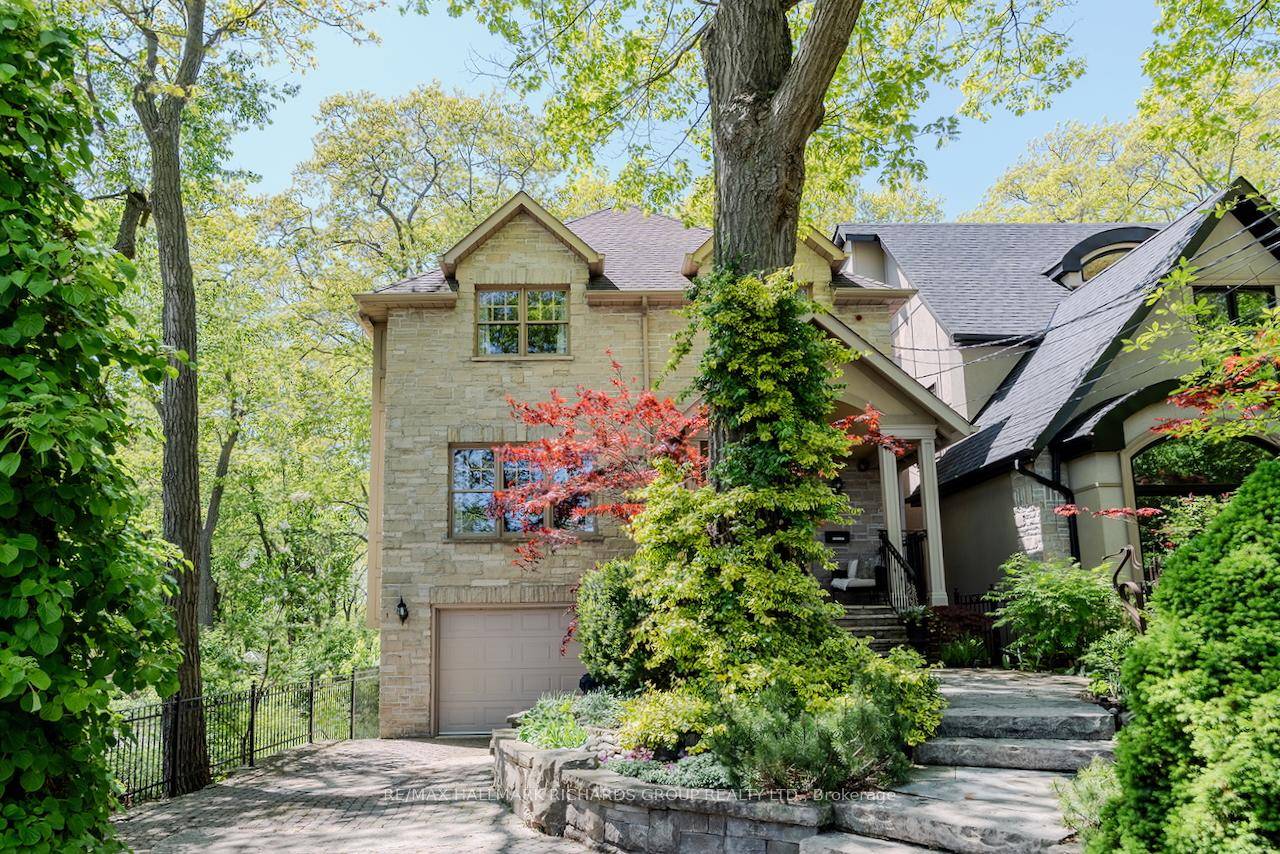 Tucked away on one of the Beach's most coveted streets, 148 Balsam Ave offers a rare blend of timeless craftsmanship, modern comfort, and ravine side serenity.
