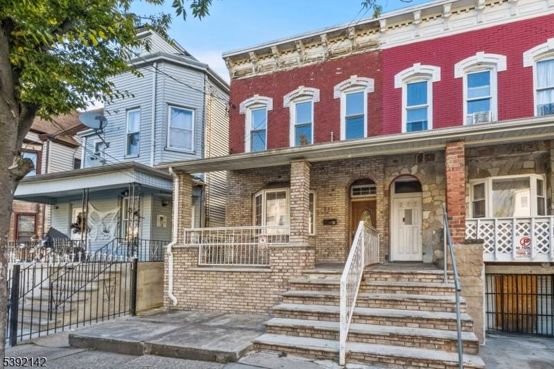 Welcome to this beautifully maintained 4 bedroom, 2 bath single family 1 2 duplex located in the heart of Newark.