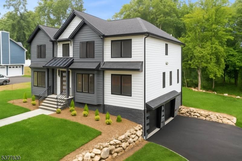 Stunning, bright, NEWLY CONSTRUCTED Colonial with a sleek blend of classic and contemporary finishes on tree lined corner lot property in West Milford just minutes from dining, shopping, parks and ...