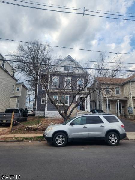 Come and see this beautifully renovated 2 Family home in the heart of Elizabeth city downtown, offering modern finishes, spacious layout and double decks in the rear of the house.