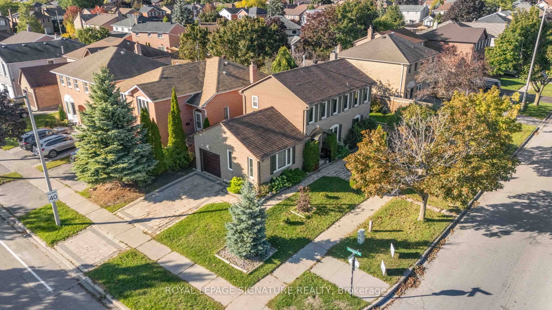 Welcome to this beautifully maintained, brick detached home on a premium corner lot, offering 3 1 bedrooms and 4 bathrooms.