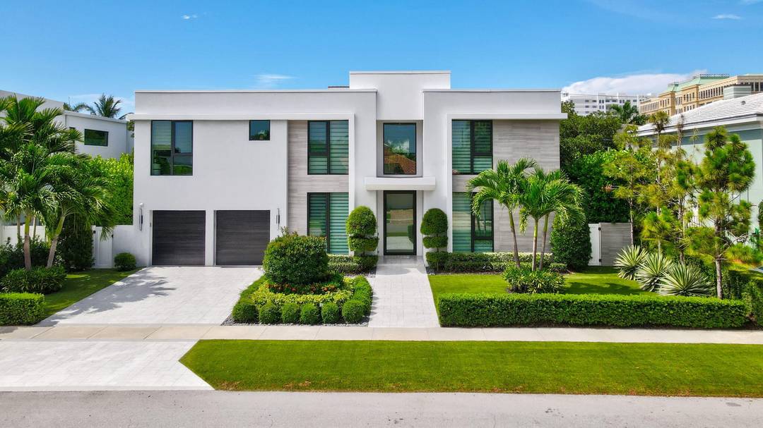 Situated in one of East Boca Raton's most coveted neighborhoods, this five bedroom, five and a half bath contemporary estate lies just steps from Mizner Park and moments from the ...