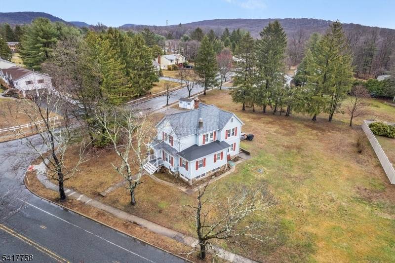 Own a piece of Morris County history with this charming 3 bedroom, 2 full bath farmhouse colonial in the highly sought after Berkshire Valley section of Roxbury Twp.