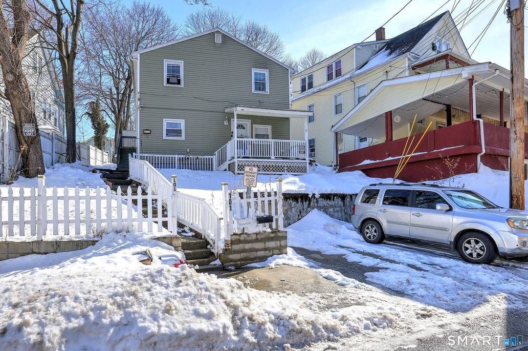 Welcome to 101 Hawkins Street, a move in ready, legal two family property.