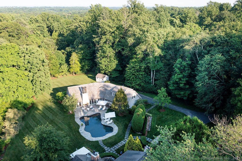474 Brookside Road is a rare, turnkey Connecticut estate an elegant 1938 home set on 2.