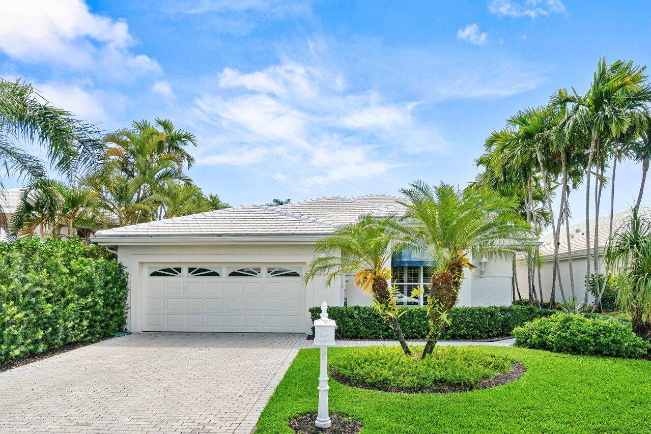 Experience luxury and comfort in this beautifully updated one story home, offering spectacular lake and golf course views.