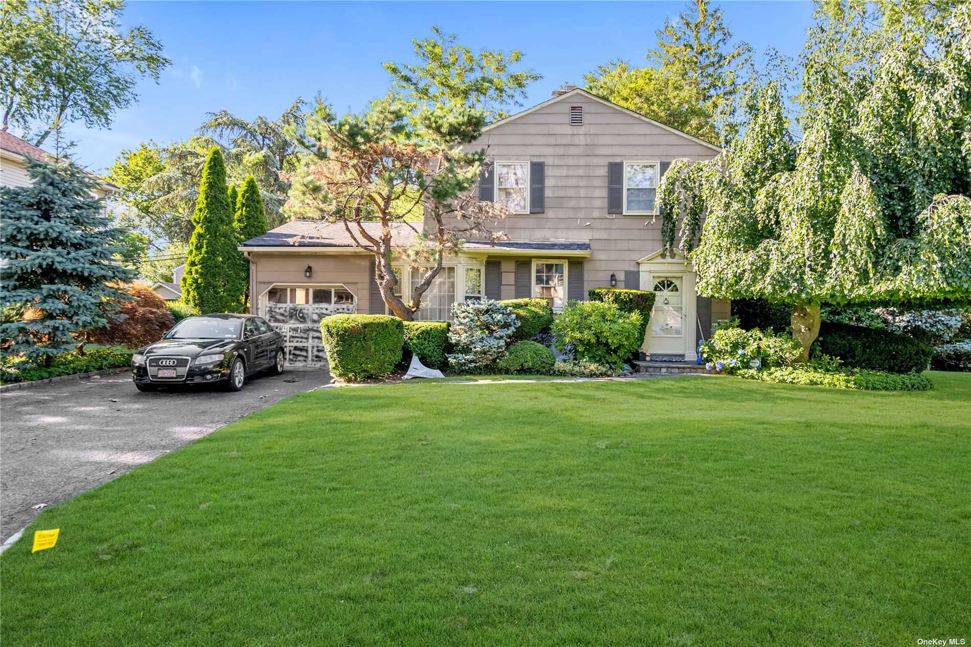 Perfectly located colonial in the heart of Albertson Downs.