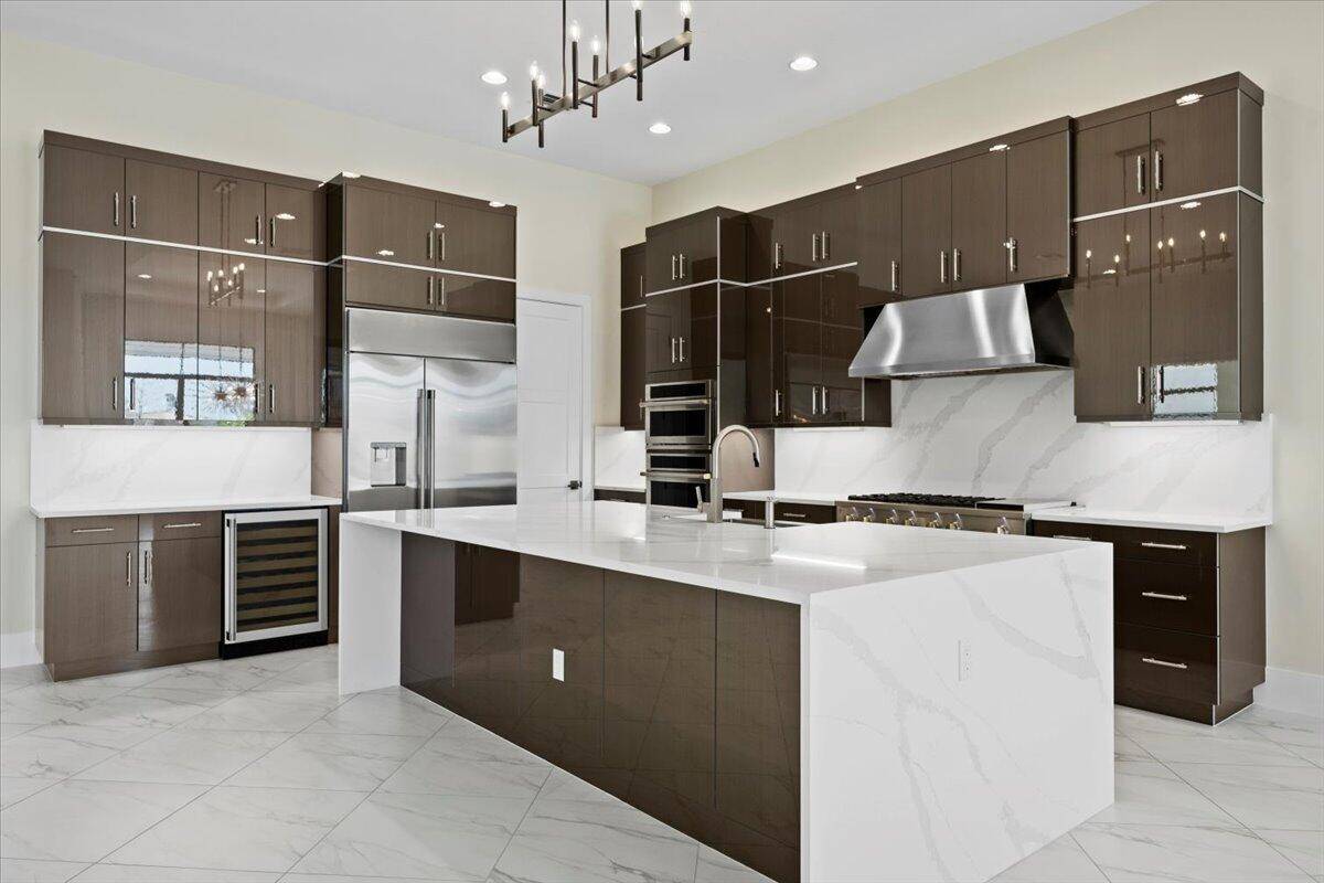 Stunning home located in Artistry features 3 bedrooms Den and 3.