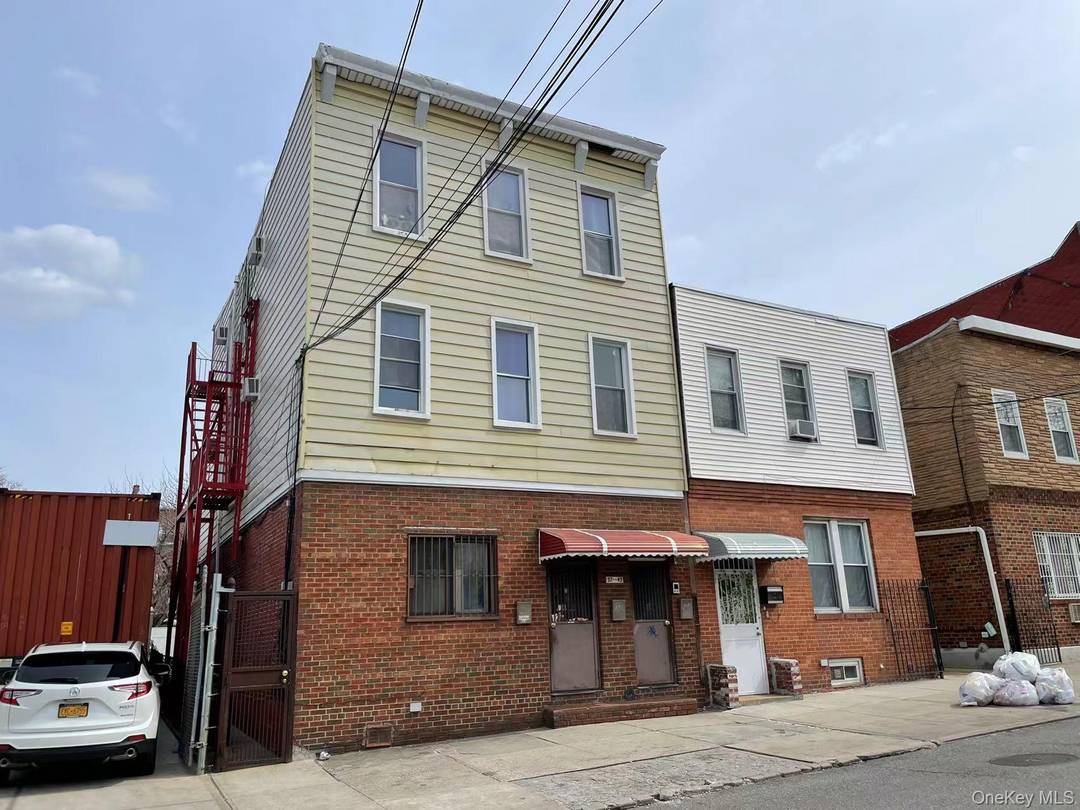 Mixed Use 3 Stories Property with 2 Residential Units and 1 Big Room on First Floor, Full Basement, 4 Electric Meters, 10 Feet High Ceiling.