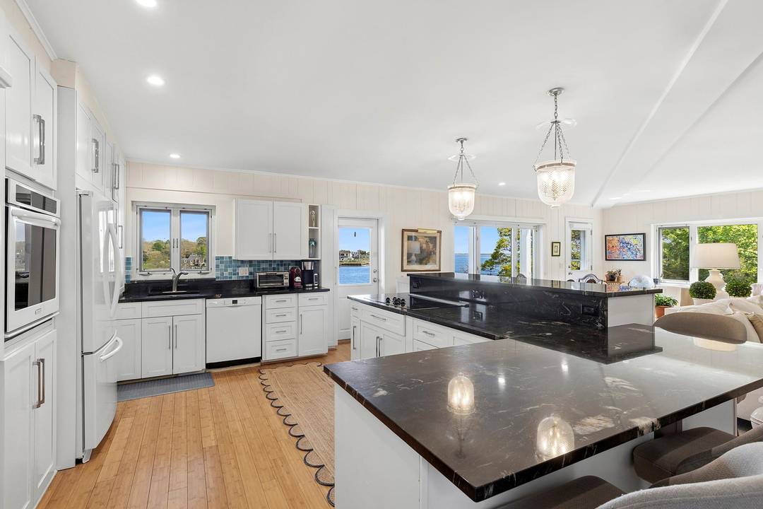 Tucked away in the serene waterfront community of Hampton Bays, this hidden gem offers the perfect blend of comfort and coastal charm.