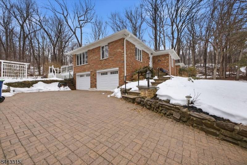 Completely updated Ranch on a cul de sac in a bucolic, private setting !