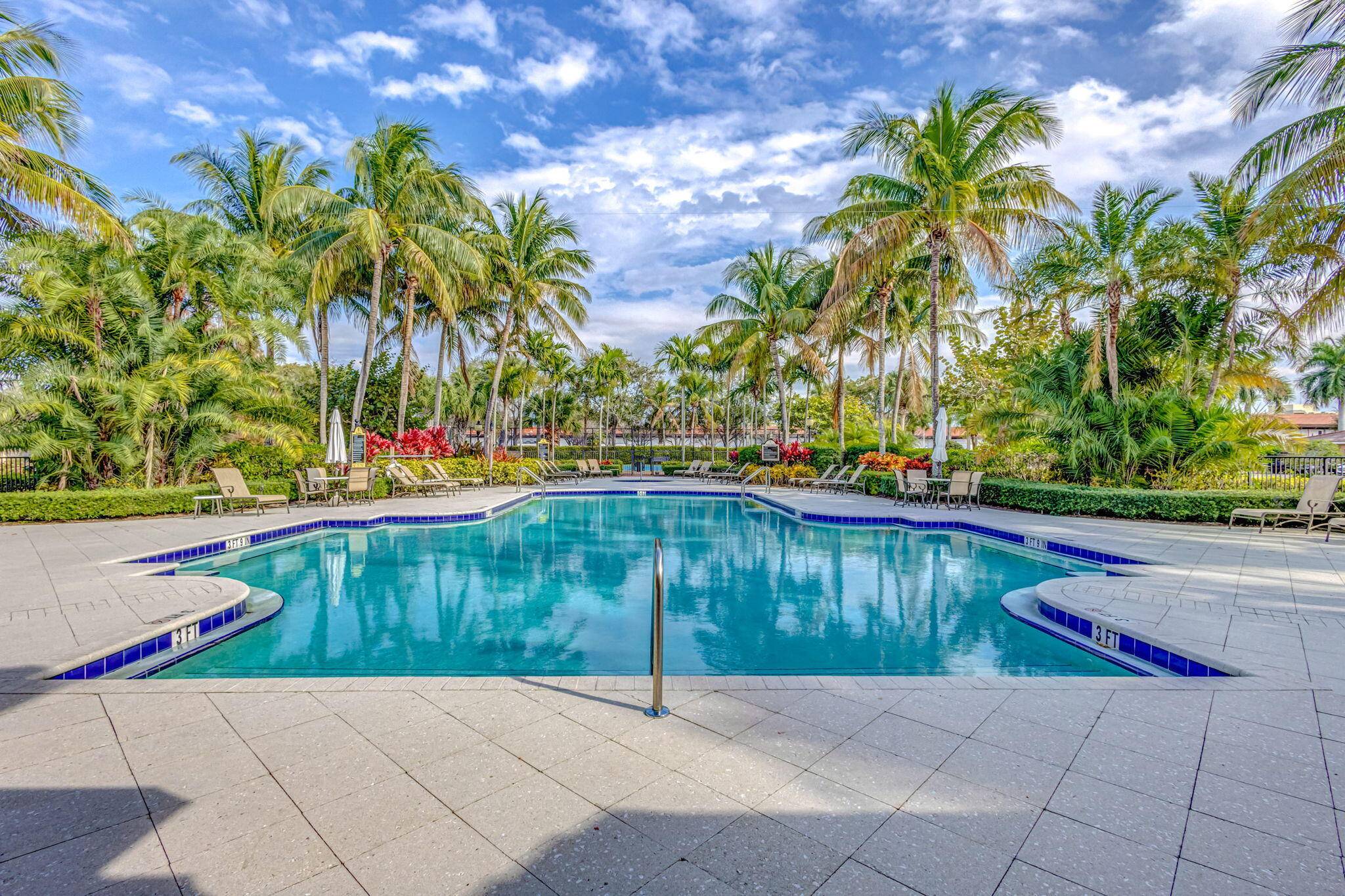 Rarely available corner unit featuring 3 bedrooms plus den located in the heart of Palm Beach Gardens' vibrant Midtown neighborhood.