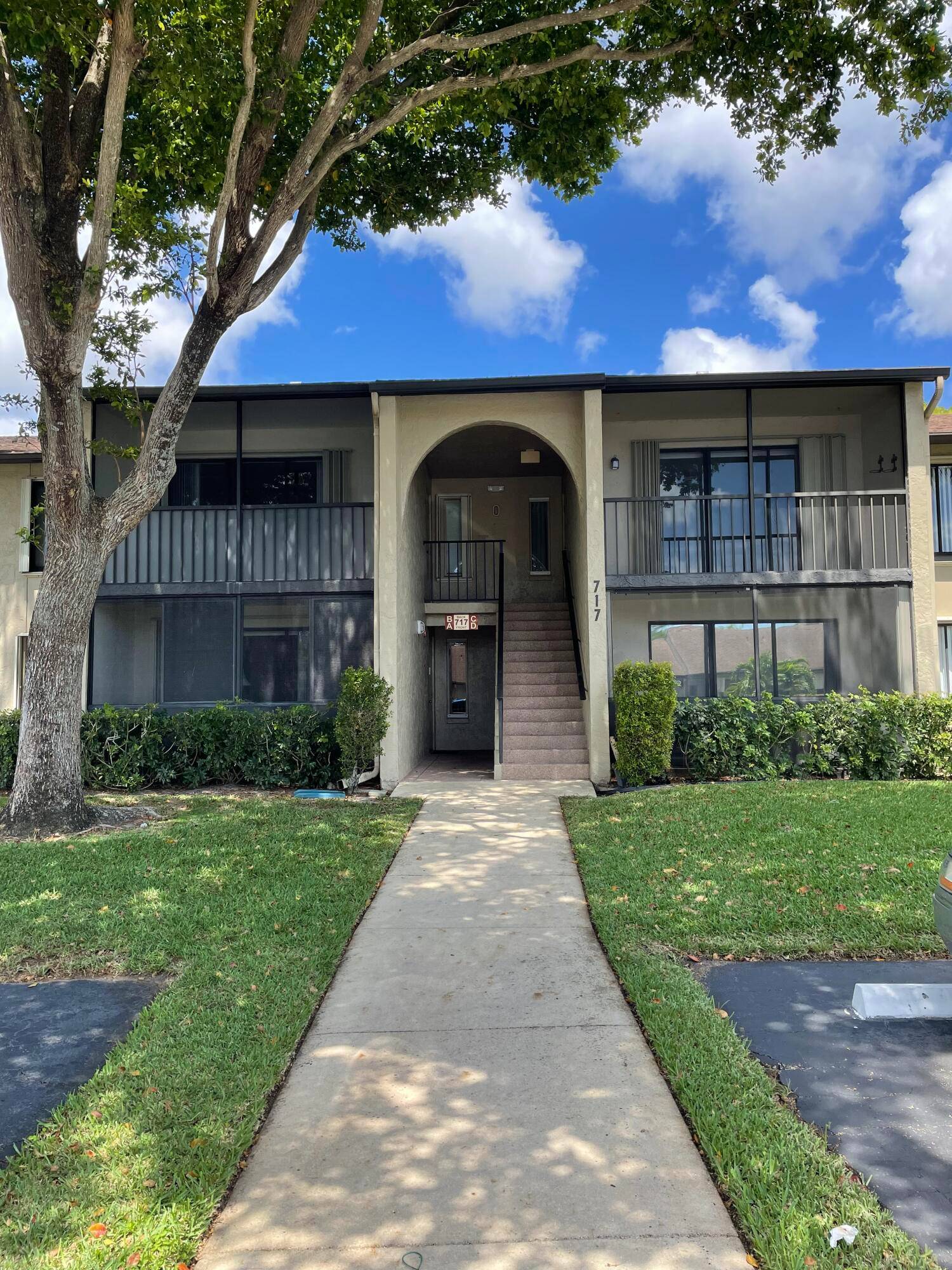 Beautiful second floor unit with an enclosed patio.