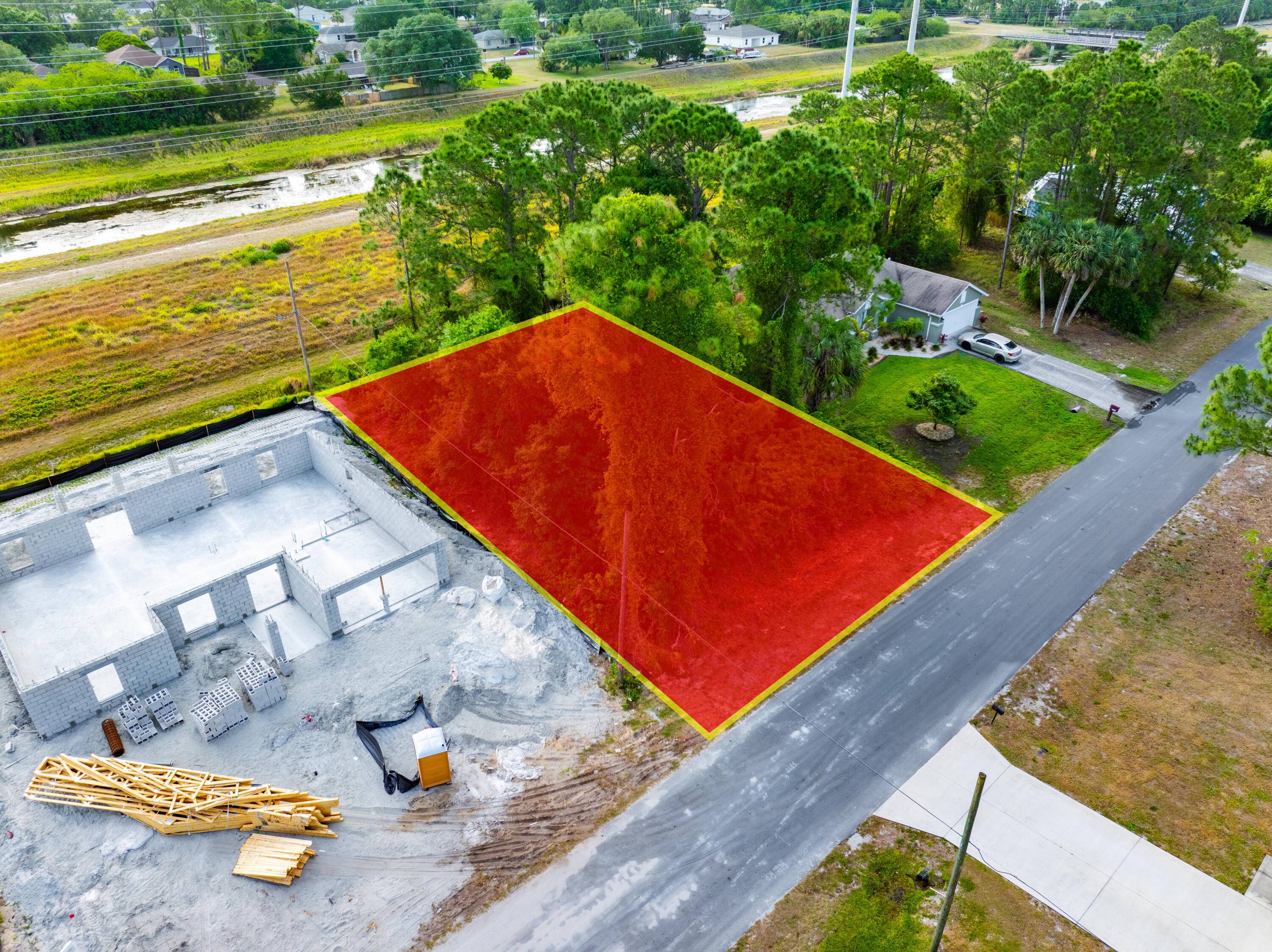 Enjoy extra breathing room in the backyard with this centrally located Palm Bay lot !